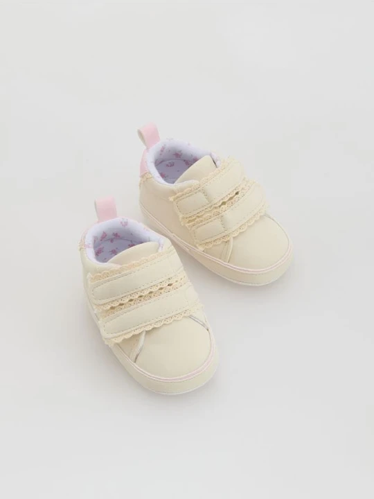Zdjęcie produktu Reserved - Sneakersy z imitacji skóry - złamana biel