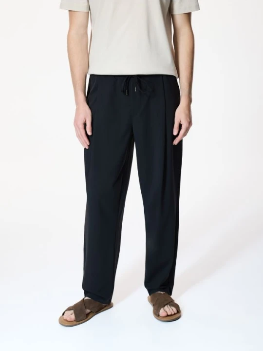 Zdjęcie produktu Reserved - Spodnie comfort fit - czarny