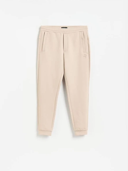 Zdjęcie produktu Reserved - Spodnie dresowe slim fit - beżowy