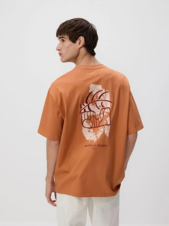 Zdjęcie produktu Reserved - T-shirt boxy z nadrukiem na plecach - brzoskwiniowy