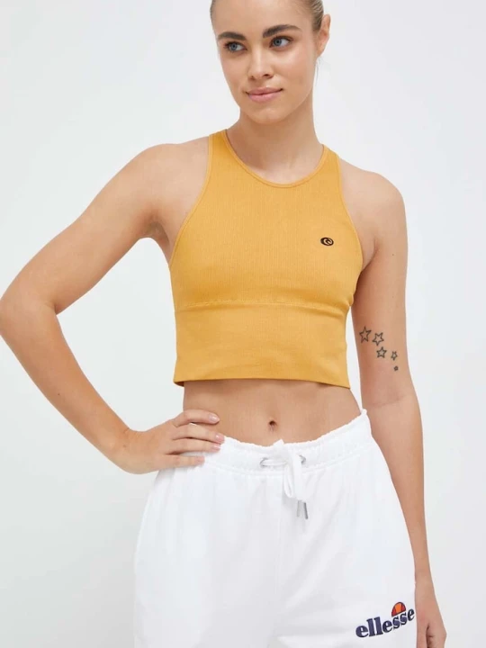 Zdjęcie produktu Rip Curl top treningowy żółty