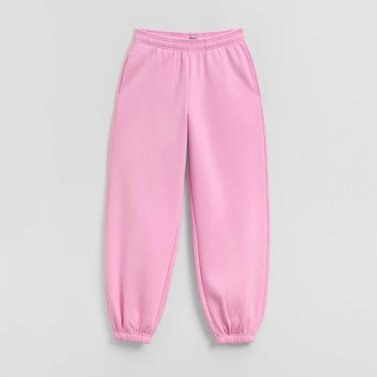 Zdjęcie produktu Różowe spodnie dresowe basic o kroju jogger House
