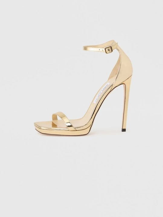 Zdjęcie produktu Sandały na obcasie Jimmy Choo w kolorze złota