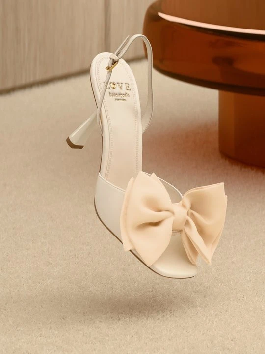 Zdjęcie produktu Sandały na obcasie Kate Spade mleczny