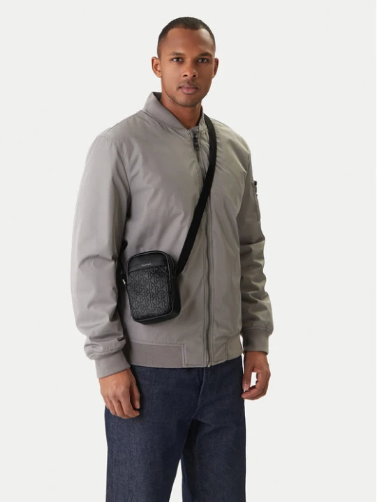 Zdjęcie produktu Saszetka Calvin Klein Emblem Aop Emboss Slim Reporter LV04D3228G Czarny