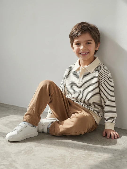 Zdjęcie produktu Sinsay - Bawełniana bluza polo w paski - kremowy