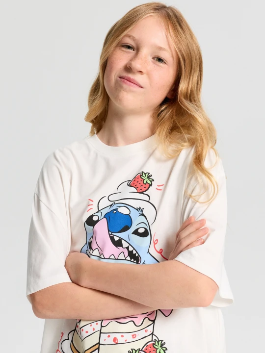 Zdjęcie produktu Sinsay - Bawełniana koszulka oversize z nadrukiem Stitch - kremowy