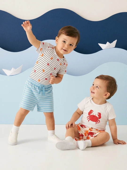 Zdjęcie produktu Sinsay - Bawełniane body z nadrukiem kraba 2 pack - kremowy