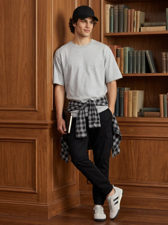 Zdjęcie produktu Sinsay - Bawełniane spodnie relaxed cargo jogger - czarny