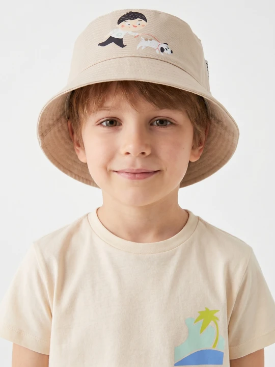 Zdjęcie produktu Sinsay - Bawełniany bucket hat z nadrukiem Pucio - kremowy