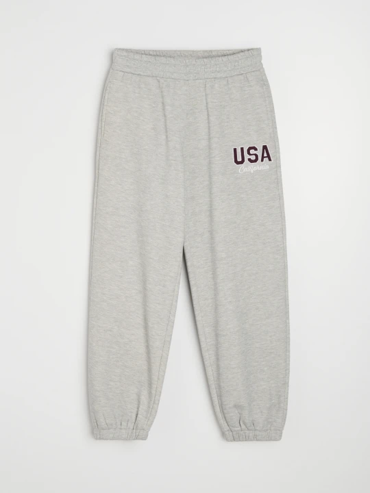 Zdjęcie produktu Sinsay - Dresowe spodnie jogger z haftowanym napisem USA - szary