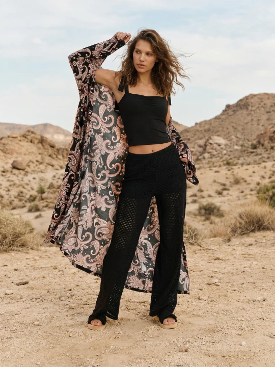 Zdjęcie produktu Sinsay - Dzianinowe spodnie flare z wbudowanymi szortami - czarny
