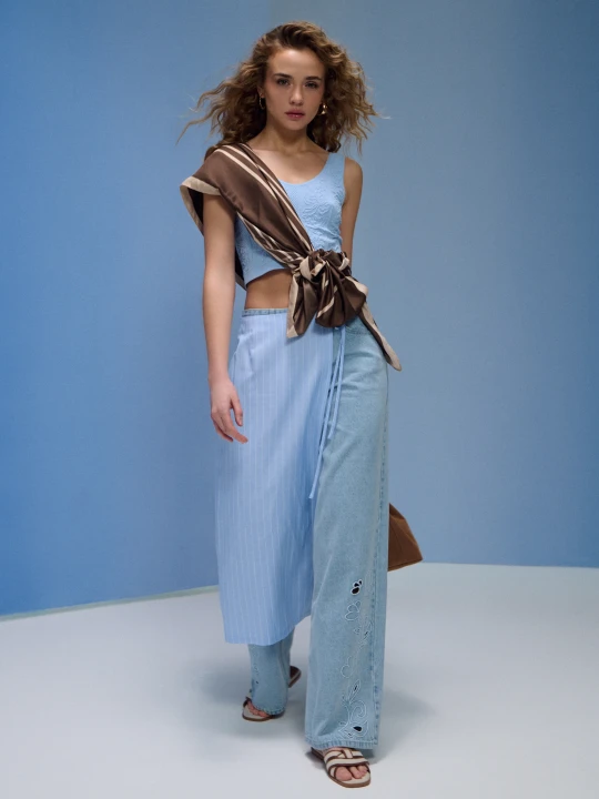 Zdjęcie produktu Sinsay - Jeansy baggy mid waist z haftowanym ażurowym detalem - niebieski