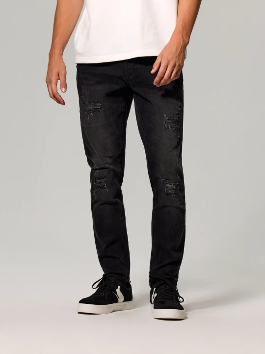 Zdjęcie produktu Sinsay - Jeansy slim fit z przetarciami i efektem sprania - czarny