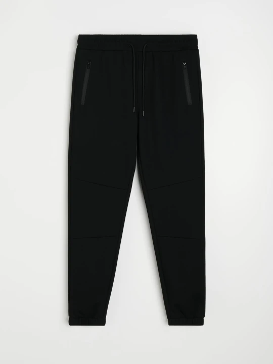 Zdjęcie produktu Sinsay - Spodnie dresowe slim fit z domieszką wiskozy - czarny