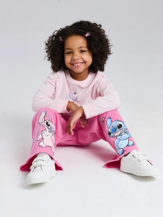 Zdjęcie produktu Sinsay - Spodnie dresowe wide leg z nadrukiem Stitch - różowy