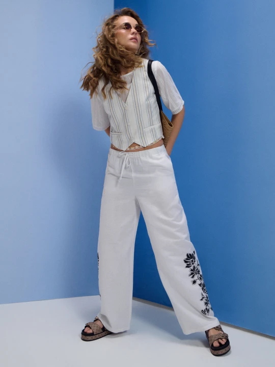 Zdjęcie produktu Sinsay - Spodnie loose fit wide leg z wiskozą i domieszką lnu - kremowy