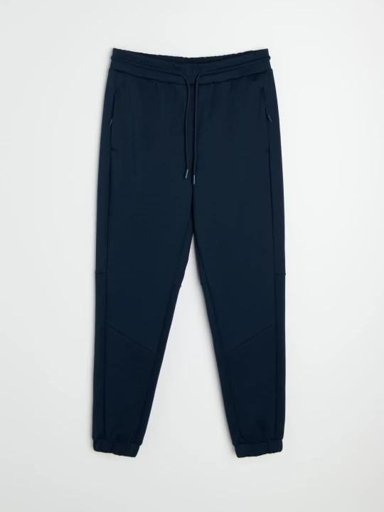 Zdjęcie produktu Sinsay - Spodnie tapered fit Active - granatowy