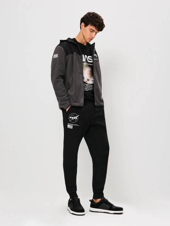 Zdjęcie produktu Sinsay - Spodnie tapered fit NASA - czarny