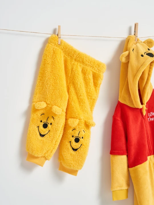 Zdjęcie produktu Sinsay - Spodnie Winnie the Pooh - żółty