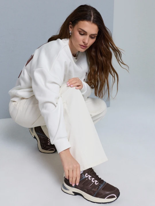 Zdjęcie produktu Sinsay - Sportowe sneakersy z siateczkową cholewką i poduszką powietrzną - brązowy