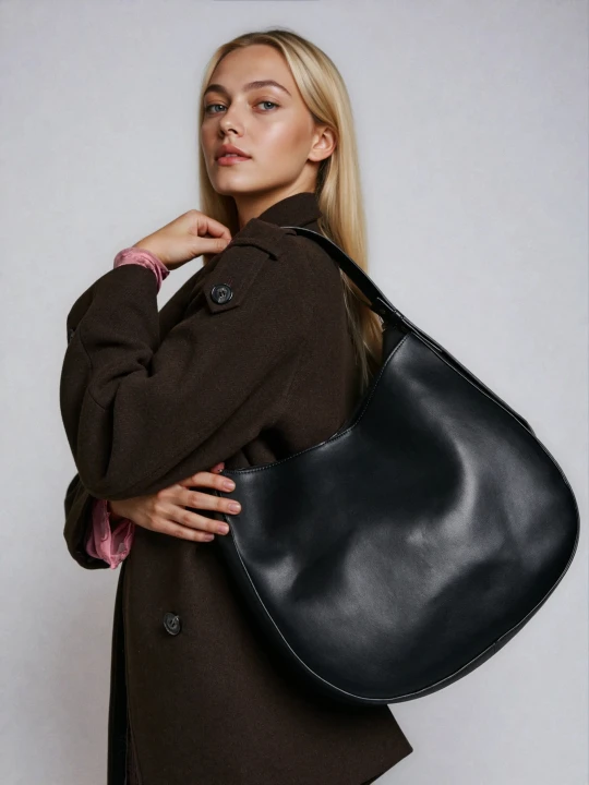 Zdjęcie produktu Sinsay - Torebka hobo z imitacji skóry - czarny