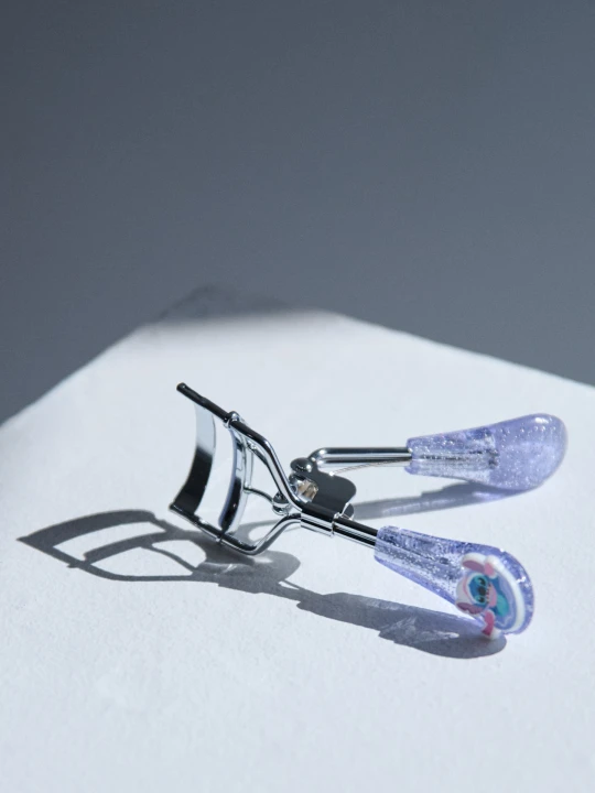 Zdjęcie produktu Sinsay - Zalotka do rzęs z motywem świątecznym Stitch - niebieski