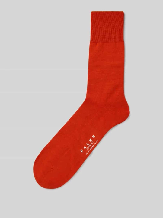 Zdjęcie produktu Skarpety z mieszanki żywej wełny model ‘Airport Sock’ Falke Ciemnopomarańczowy