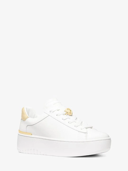 Zdjęcie produktu Skórzane sneakersy Dottie na platformie Michael Kors BLADOZŁOTY (Złoty)