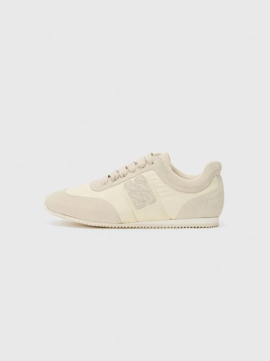 Zdjęcie produktu Sneakersy niskie Casadei mleczny
