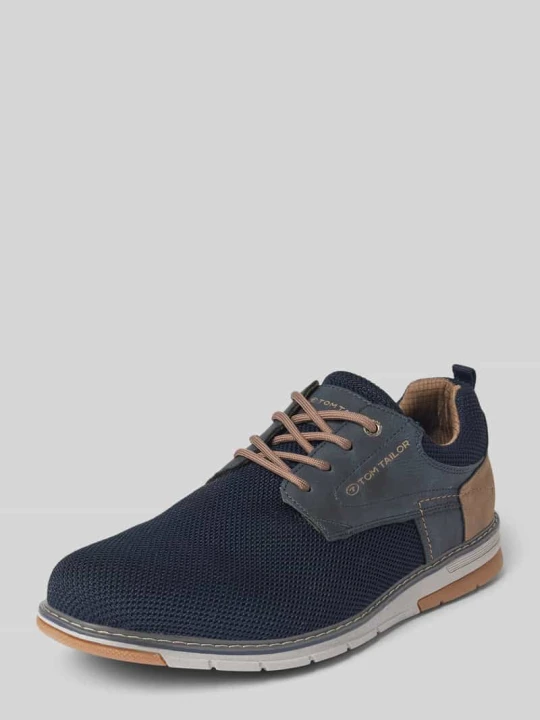 Zdjęcie produktu Sneakersy niskie z efektem dzianiny z wysokiej jakości aplikacjami z imitacji skóry Tom Tailor Granatowy