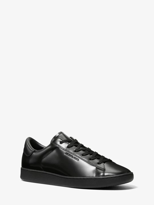 Zdjęcie produktu Sneakersy Reign z lakierowanej skóry Michael Kors CZARNY (Czarny)