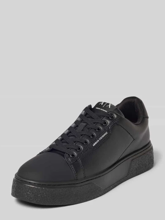 Zdjęcie produktu Sneakersy z mieszanki skóry z detalem z logo model 'Lion' Armani Exchange Czarny