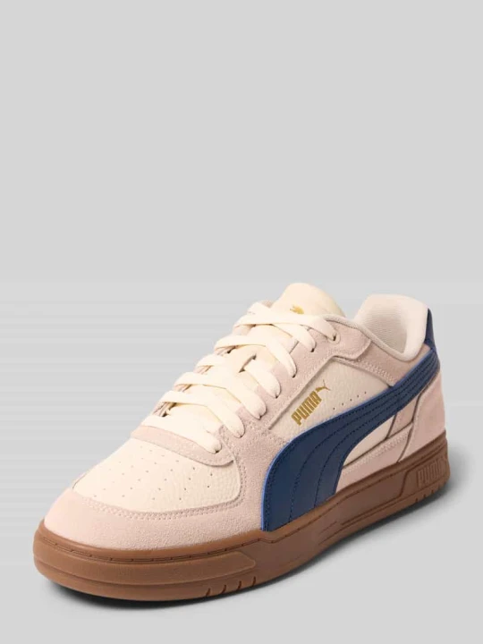 Zdjęcie produktu Sneakersy z paskiem w kontrastowym kolorze z boku Puma
