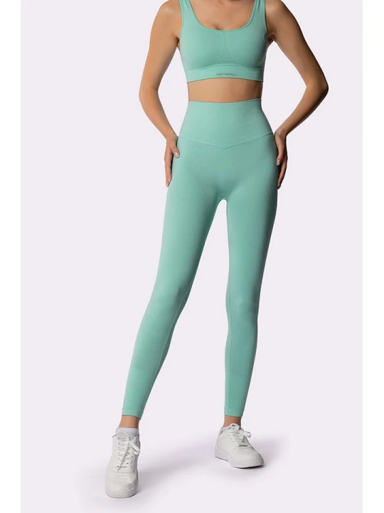 Zdjęcie produktu Spaio Legginsy sportowe "Adapt" w kolorze turkusowym rozmiar: S