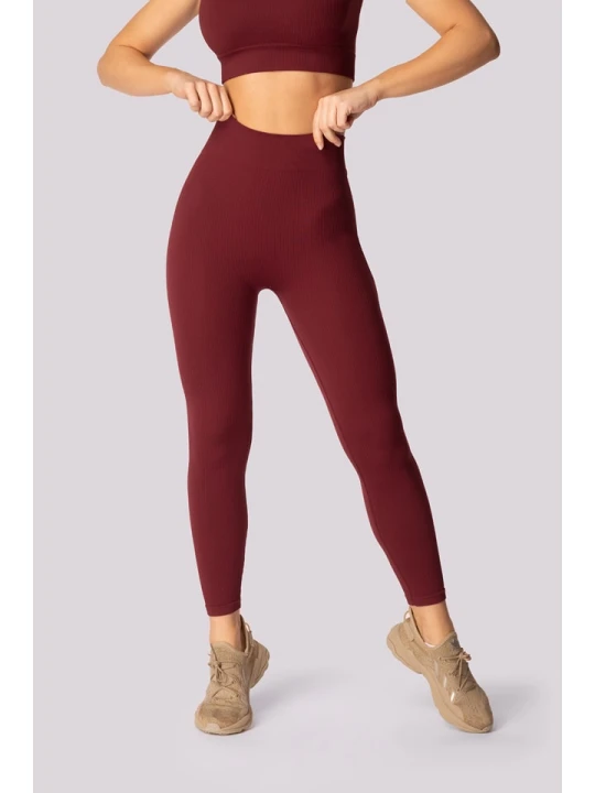 Zdjęcie produktu Spaio Legginsy sportowe "Ribbed" w kolorze bordowym rozmiar: M/L
