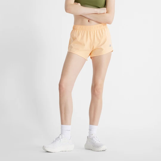 Zdjęcie produktu Spodenki damskie New Balance WS41286PAE – pomarańczowe