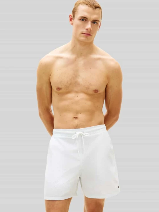 Zdjęcie produktu Spodenki kąpielowe o kroju regular fit z wyhaftowanym logo Tommy Hilfiger Jasnoniebieski