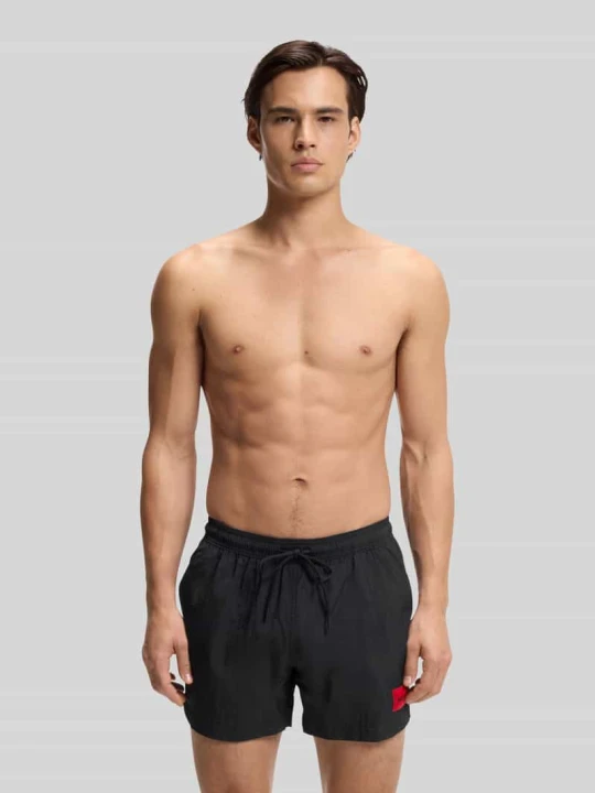 Zdjęcie produktu Spodenki kąpielowe z naszywką z logo model "DOMINICA" Hugo Czarny