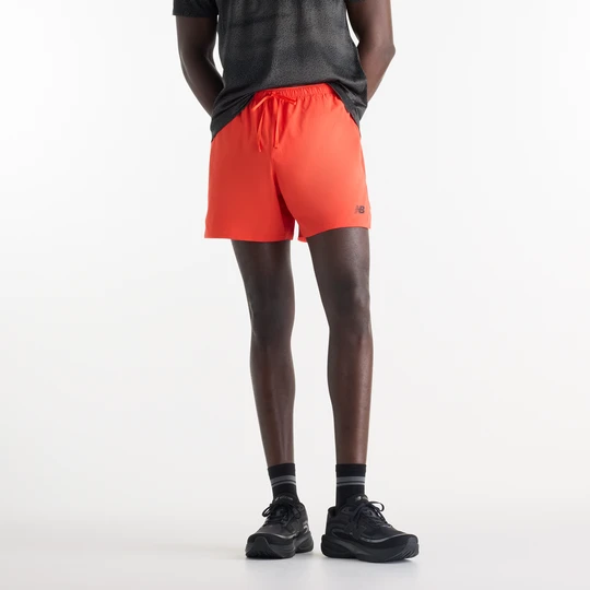 Zdjęcie produktu Spodenki męskie New Balance MB6180TANEF – pomarańczowe