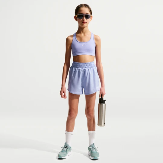 Zdjęcie produktu Spodenki treningowe z tkaniny z wysokim stanem dla dużych dzieci (dziewcząt) Nike Dri-FIT One - Fiolet