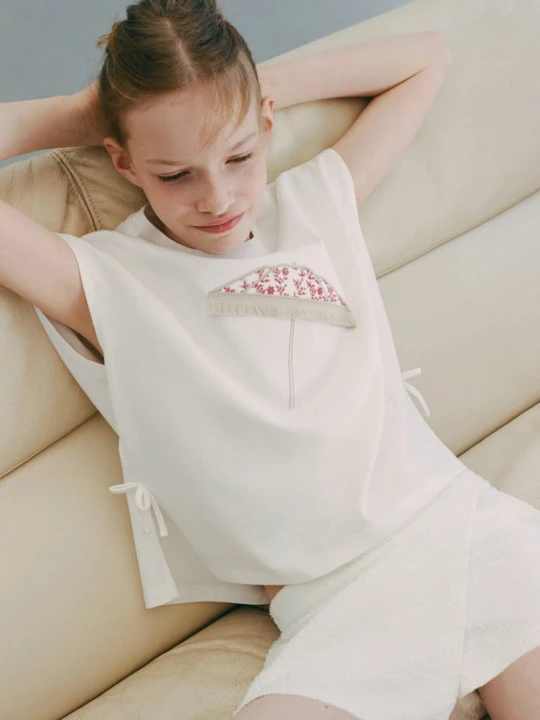 Zdjęcie produktu Spódnica z wbudowanymi spodenkami z dzianiny złamana biel - Dzieci - lata - MANGO KIDS