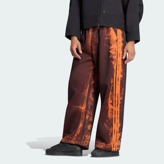 Zdjęcie produktu SPODNIE ADILENIUM 6 Z DZIANINY DYSTANSOWEJ Adidas Craft Orange