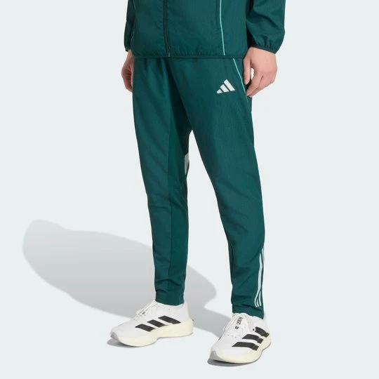 Zdjęcie produktu Spodnie Arsenal Tiro 25 Competition Presentation Adidas Aurora Ivy