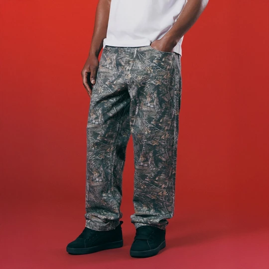 Zdjęcie produktu Spodnie baggy z motywem camo real tree House