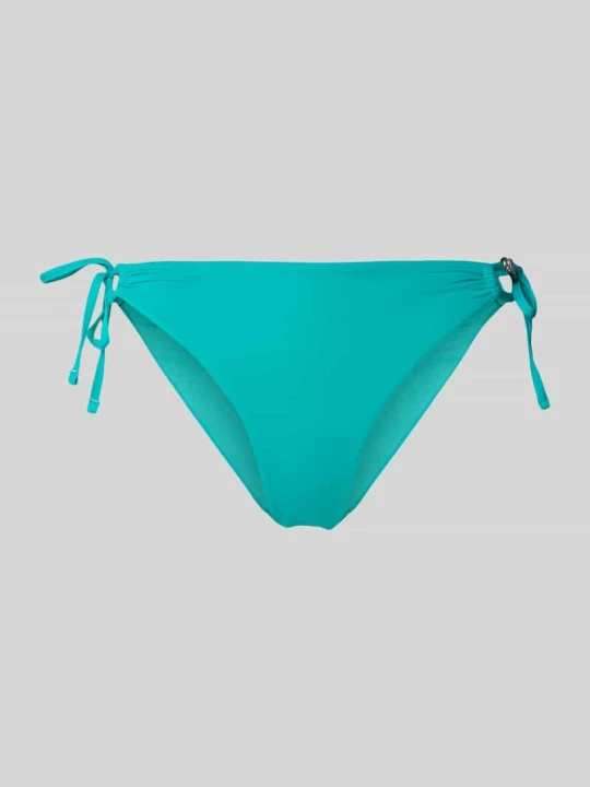 Zdjęcie produktu Figi bikini o kroju slim fit z obszyciem ozdobnymi kamieniami Guess Turkusowy