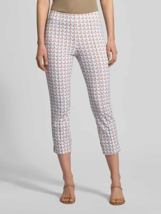 Zdjęcie produktu Spodnie capri z domieszką stretchu w skrójonym kroju SEDUCTIVE Jasnoniebieski