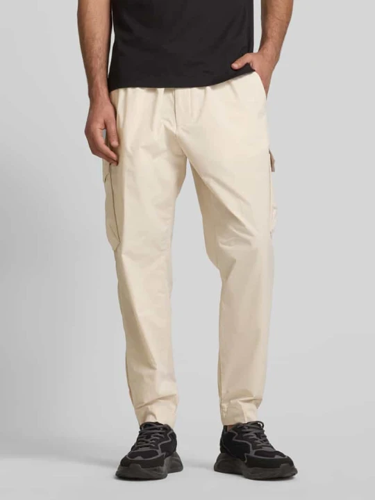 Zdjęcie produktu Spodnie cargo o kroju tapered fit z elastycznym pasem model ‘Urbanex’ Boss Beżowy