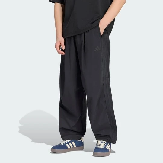 Zdjęcie produktu Spodnie City Tech z 3 paskami Adidas czarny