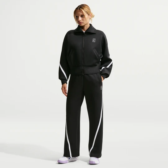 Zdjęcie produktu Spodnie damskie do tenisa ze średnim stanem Dri-FIT Nike Advantage - Czerń